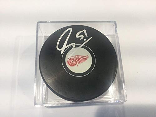 Франс Нилсен подписа хокей шайба Detroit Red Wings с автограф a - Autographed NHL Pucks